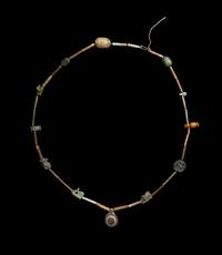 An Egyptian Faience Bead and Amulet Necklace