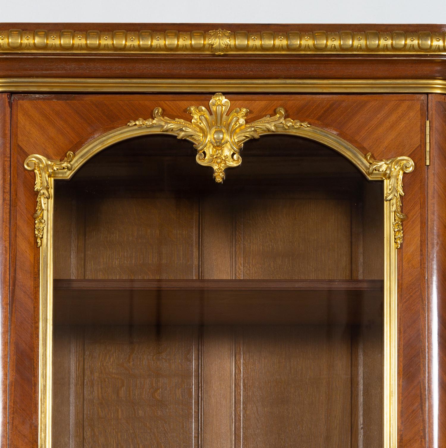 A Louis XV Style Gilt Bronze Mounted Kingwood Breakfront Cabinet
