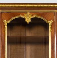 A Louis XV Style Gilt Bronze Mounted Kingwood Breakfront Cabinet