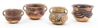 A Group of Nine Neolithic Style Pottery Vessels Height of tallest 12 inches.