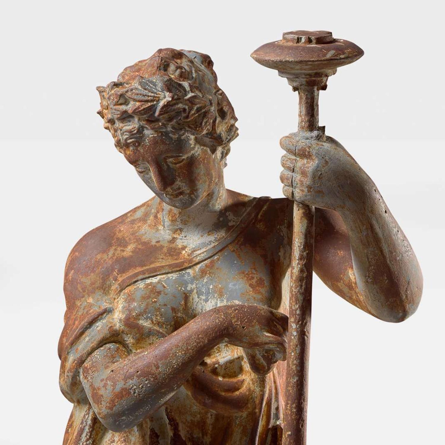 A cast iron garden figure of a Classical lady late 19th century