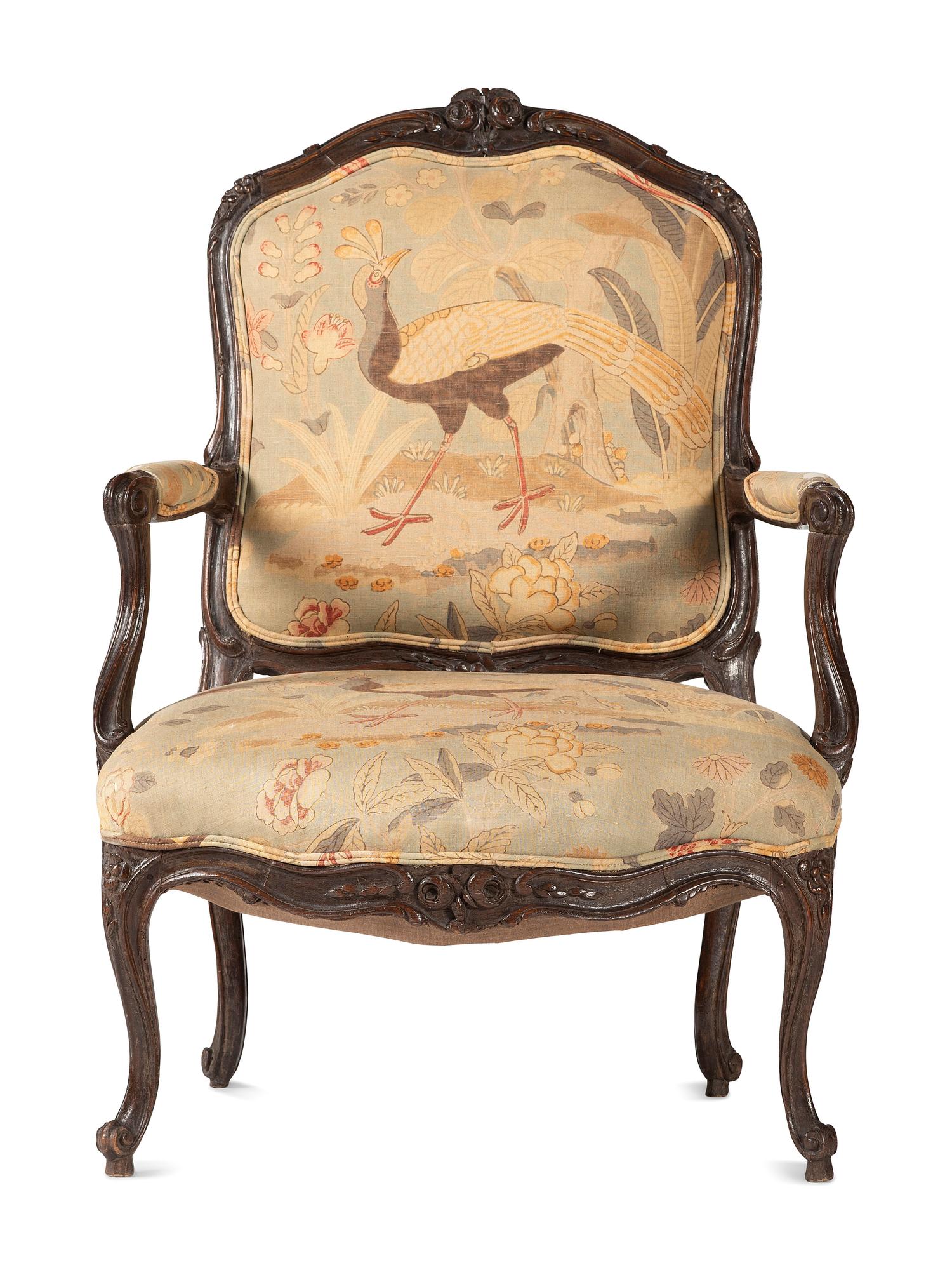 A Louis XV Carved Walnut Upholstered Fauteuil