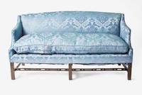 A George III box-form mahogany sofa with blue silk damask upholstery, second half 18th century