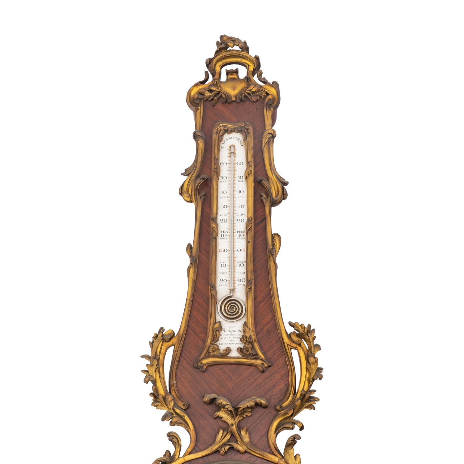 A Louis XV Style Gilt Bronze Mounted Kingwood Cartel Clock and Barometer