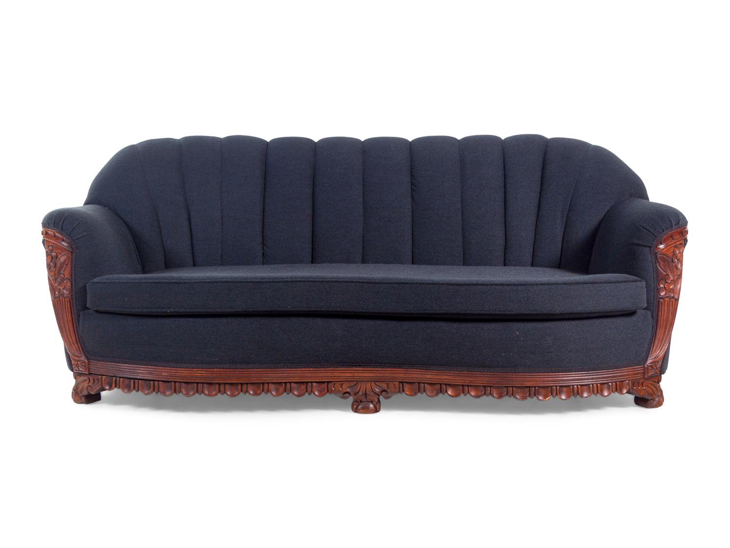 An Art Deco Style Carved Walnut Sofa and Armchair