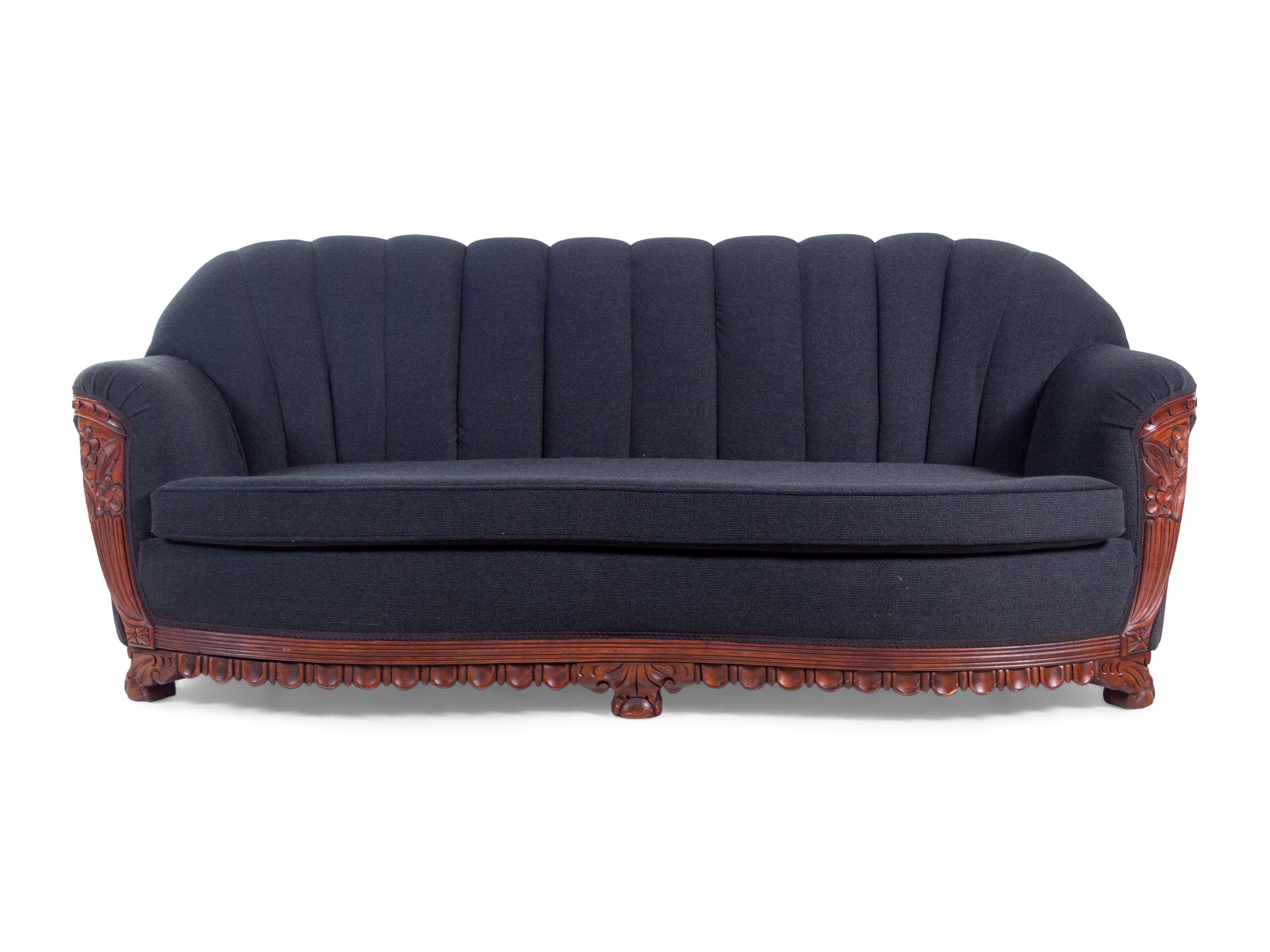 An Art Deco Style Carved Walnut Sofa and Armchair