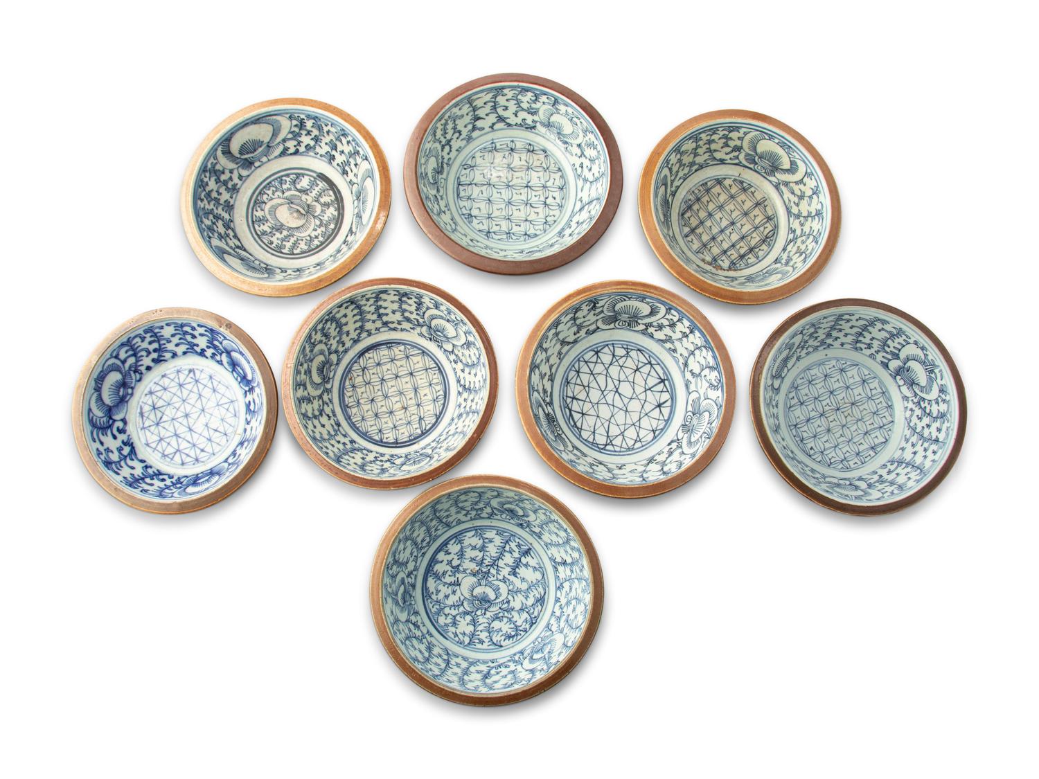 A Set of Eight Chinese Export Brown Glazed and Blue and White Bowls