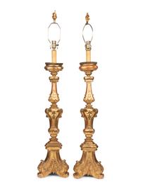 A Pair of Italian Giltwood Prickets Mounted as Lamps