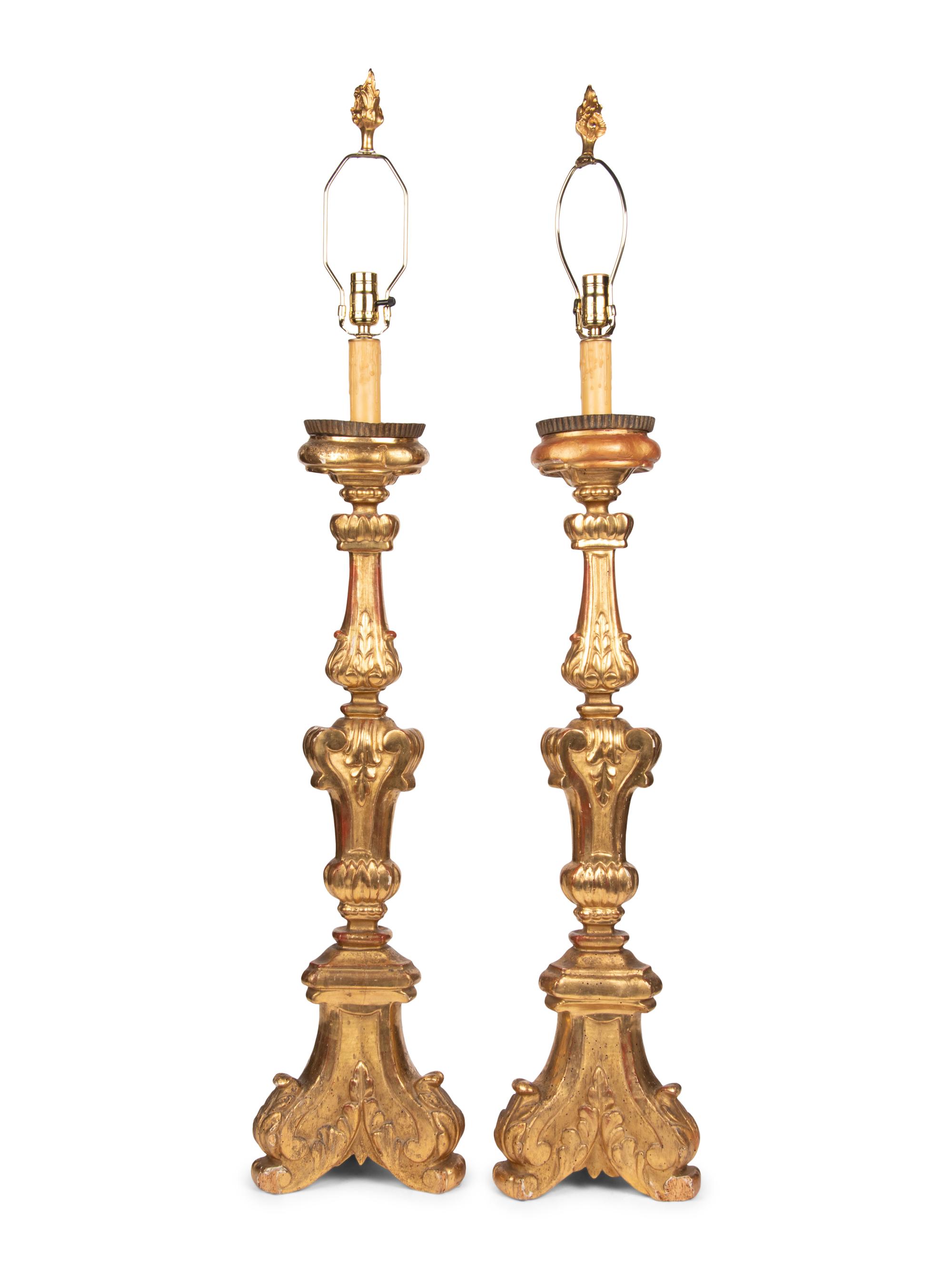 A Pair of Italian Giltwood Prickets Mounted as Lamps