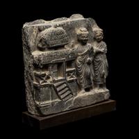 A Gandharan Grey Schist Frieze, 3rd-4th Century 三-四世紀 犍陀羅灰片岩佛祖尋訪圖石雕殘片