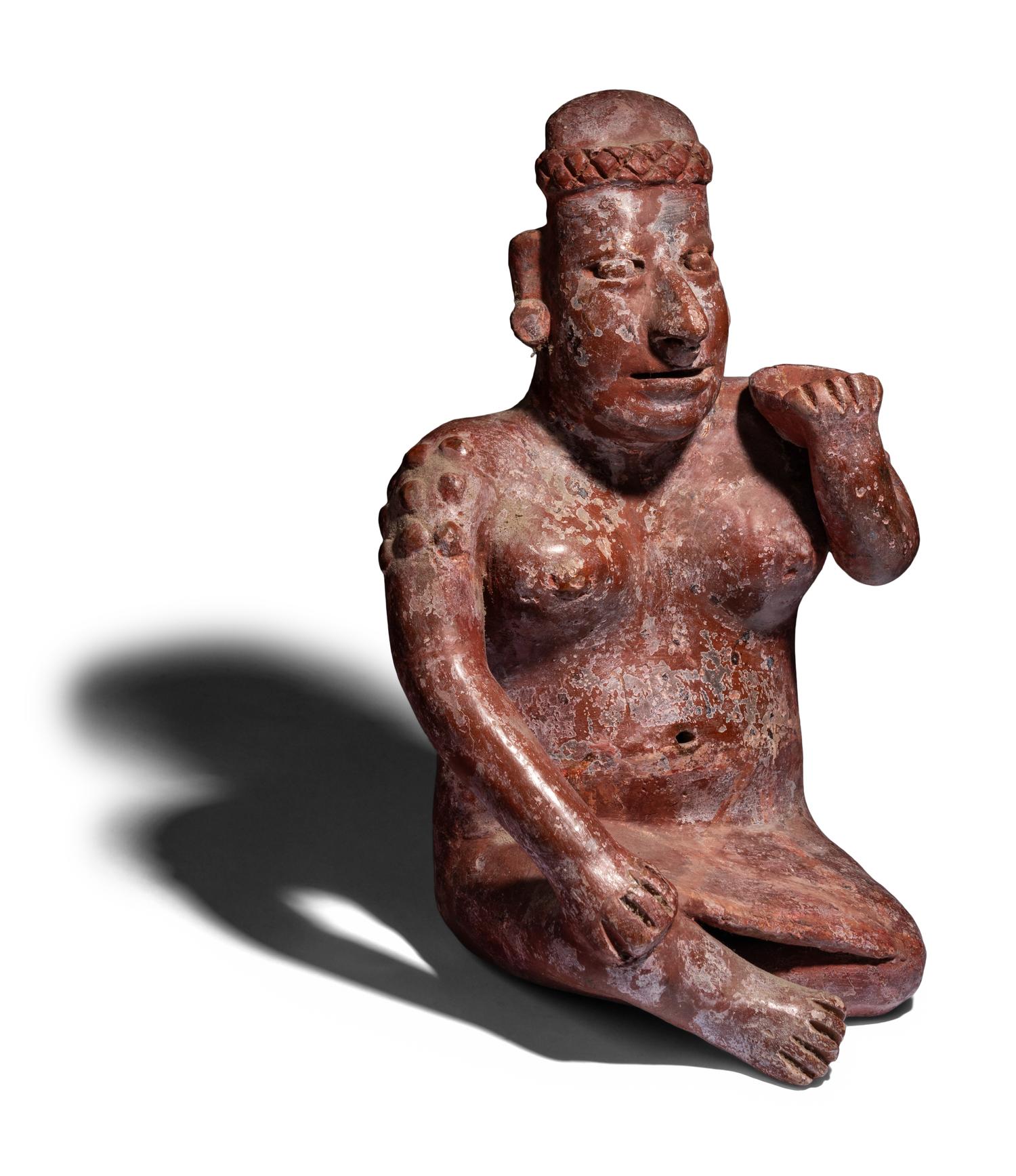 A Colima Seated Figure