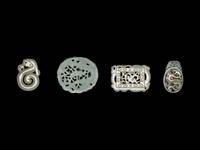 Four Chinese Celadon Jade Pendants