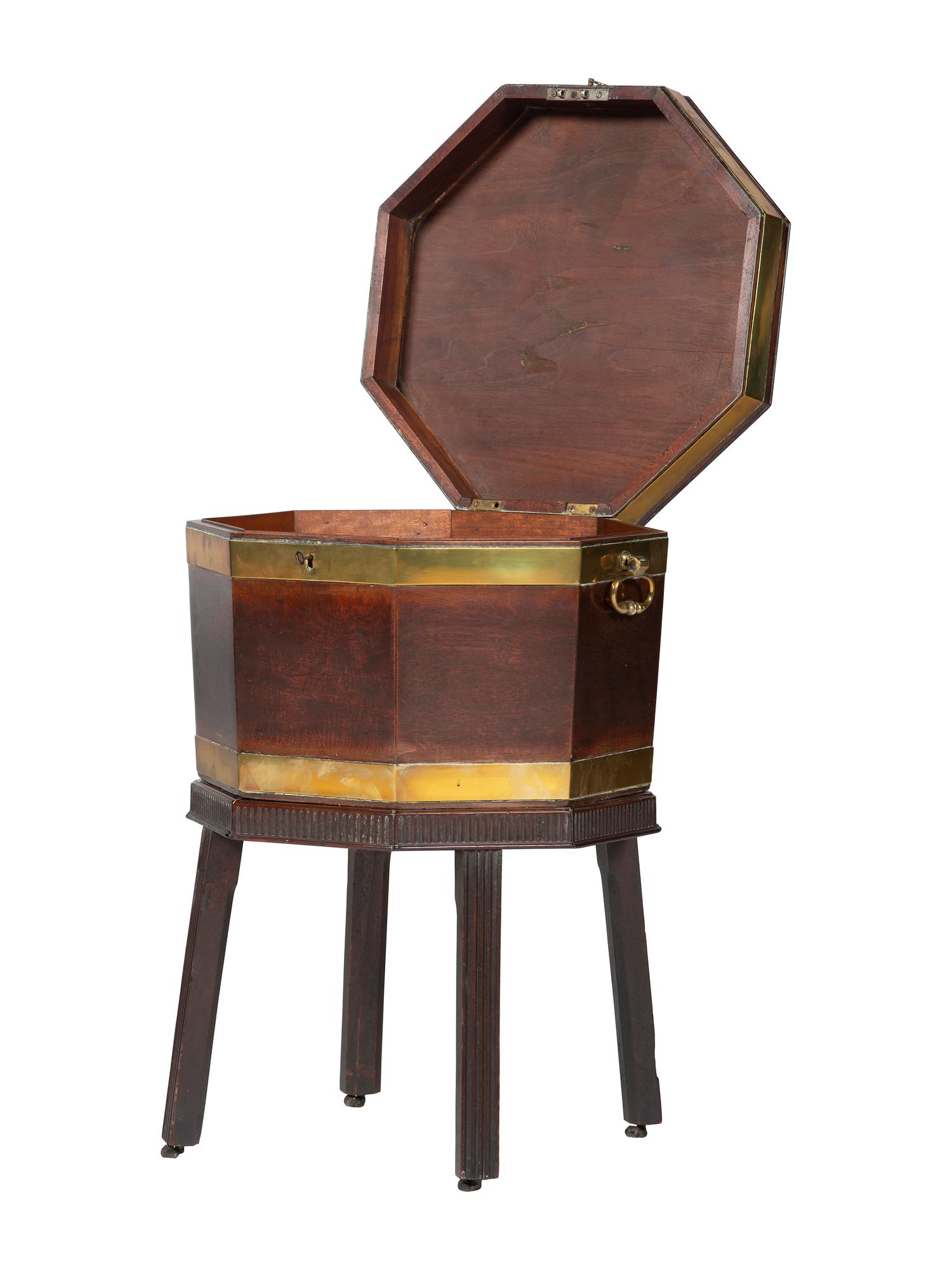 A Georgian Mahogany Brass Mounted Wine Cooler on Stand