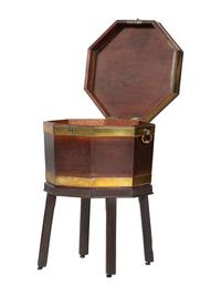 A Georgian Mahogany Brass Mounted Wine Cooler on Stand
