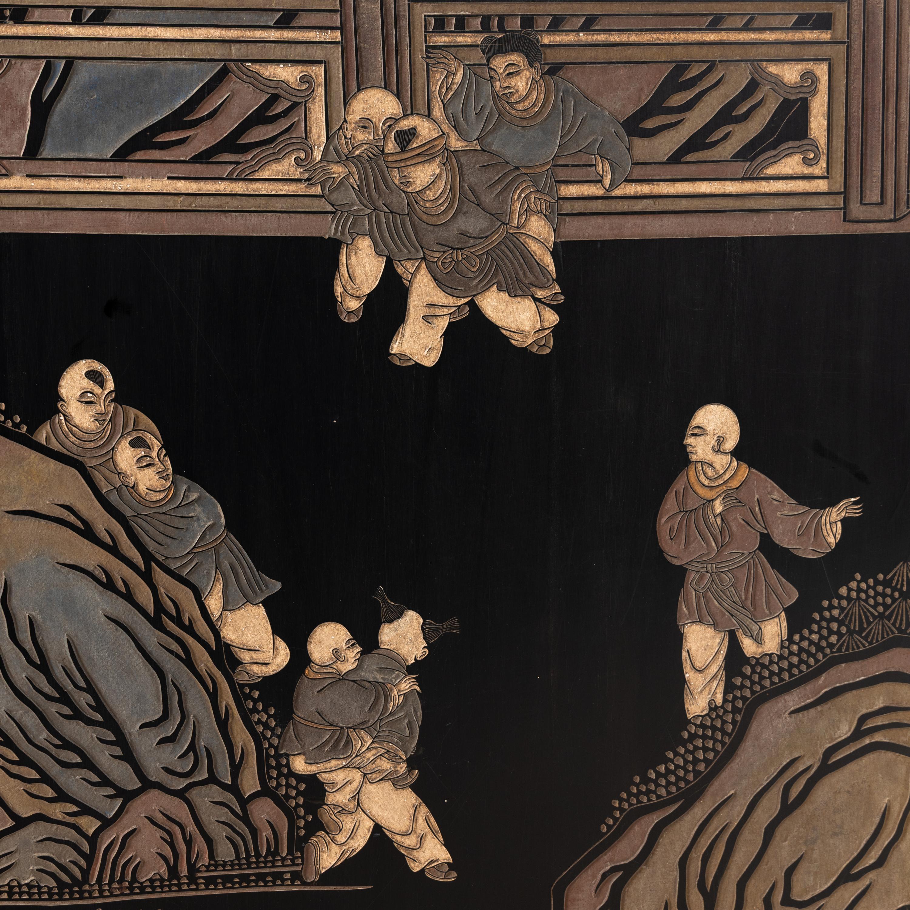 A Chinese Lacquer Twelve-Panel Floor Screen
