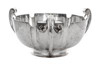 An Edwardian Silver Center Bowl, Elkington & Co., London, 1905, having three scroll handles.