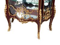 A Pair of Louis XV Style Gilt Bronze Mounted Mahogany Vitrine Cabinets