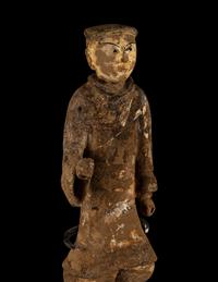 A Chinese Painted Grey Pottery Figure of a Figure