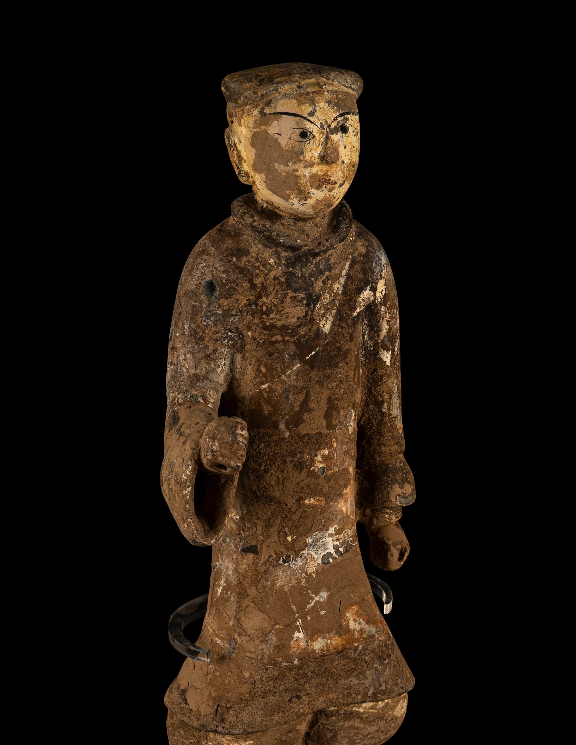 A Chinese Painted Grey Pottery Figure of a Figure