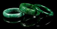 Three Chinese Green Jade and Jadeite Bangles