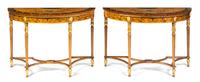 A Pair of Edwardian Style Satinwood and Parcel Gilt Console Tables, Height 32 x width 45 x depth 19 inches.
