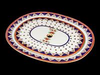A Chinese Export Famille Rose Porcelain Platter and Strainer