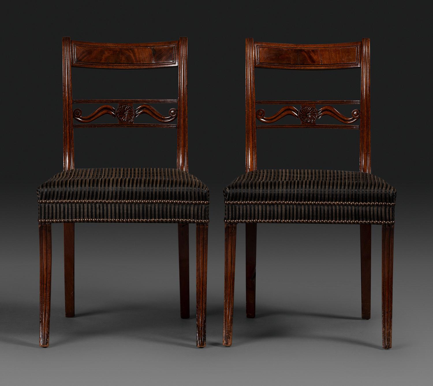 A Pair of Classical Carved and Figured Mahogany Klismos Side Chair