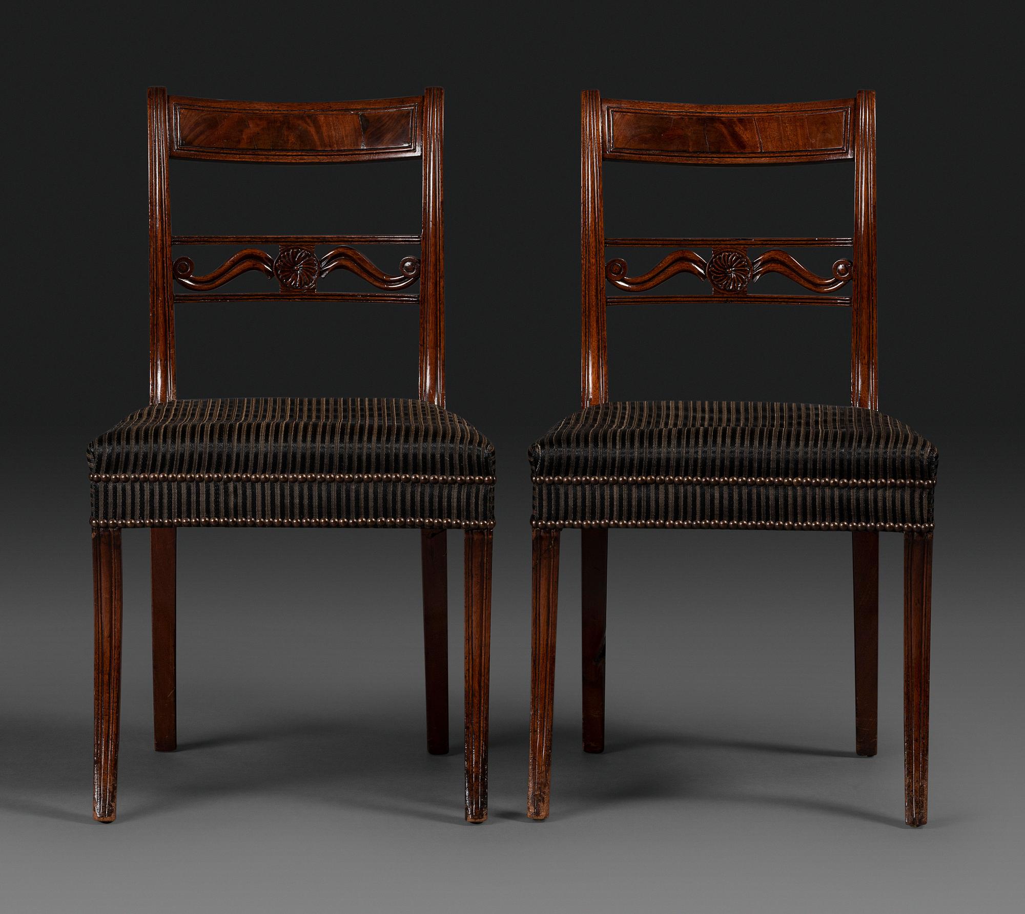 A Pair of Classical Carved and Figured Mahogany Klismos Side Chair