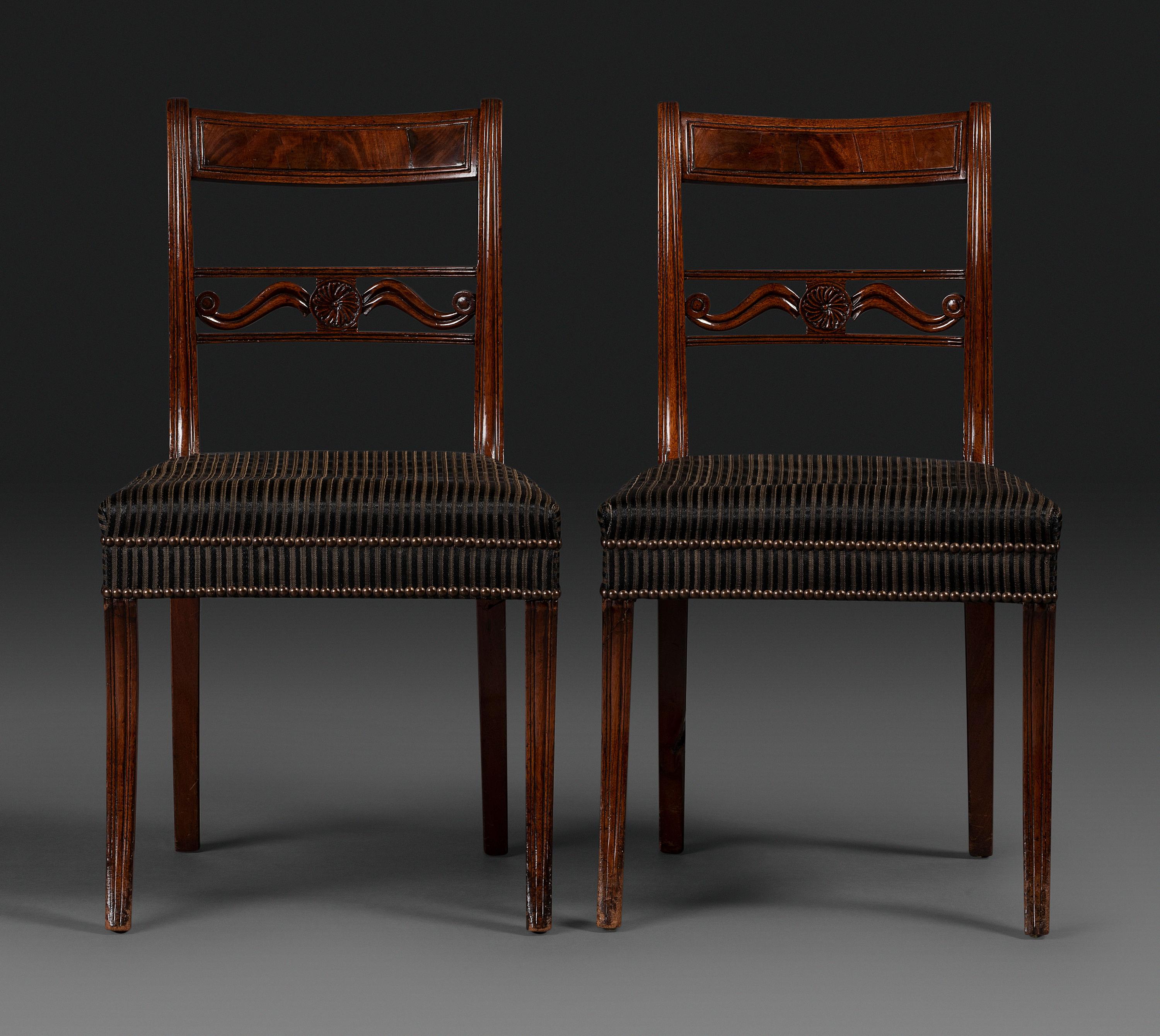 A Pair of Classical Carved and Figured Mahogany Klismos Side Chair