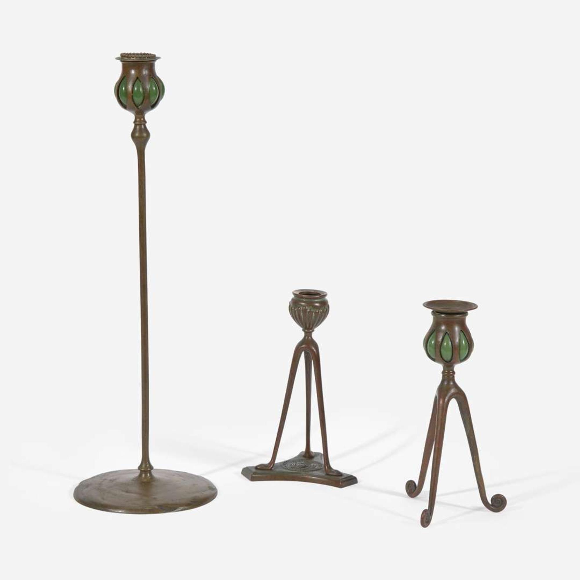 Tiffany Studios (American, active 1878-1932) Group of Three Bronze Candlesticks, New York, circa 1900-1905