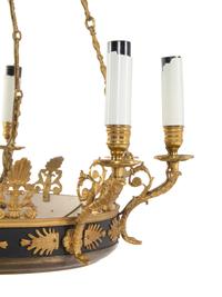 An Empire Style Gilt Bronze and Green Tôle Eight-Light Chandelier