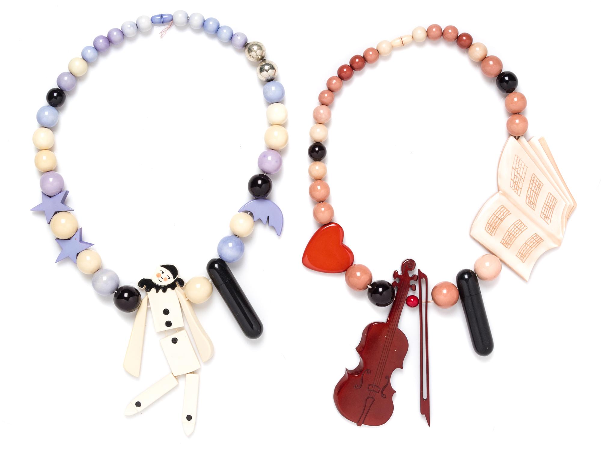 A Pair of Isadora Paris Whimsical Bead Necklaces, 22".