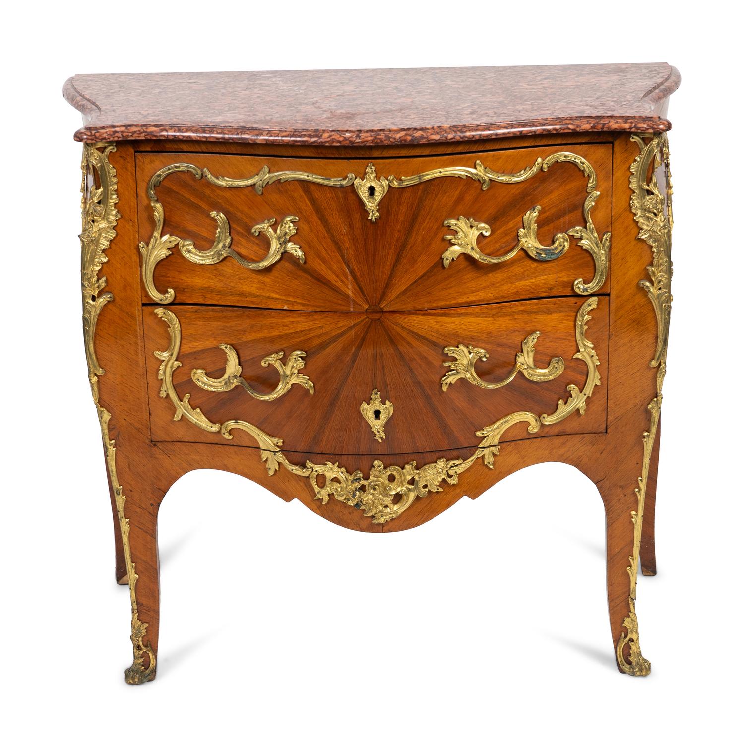 A Louis XV Style Bombe Commode with Sunburst Veneer and Gilt Metal Mounts — EARLY 20TH CENTURY