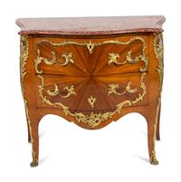 A Louis XV Style Bombe Commode with Sunburst Veneer and Gilt Metal Mounts — EARLY 20TH CENTURY