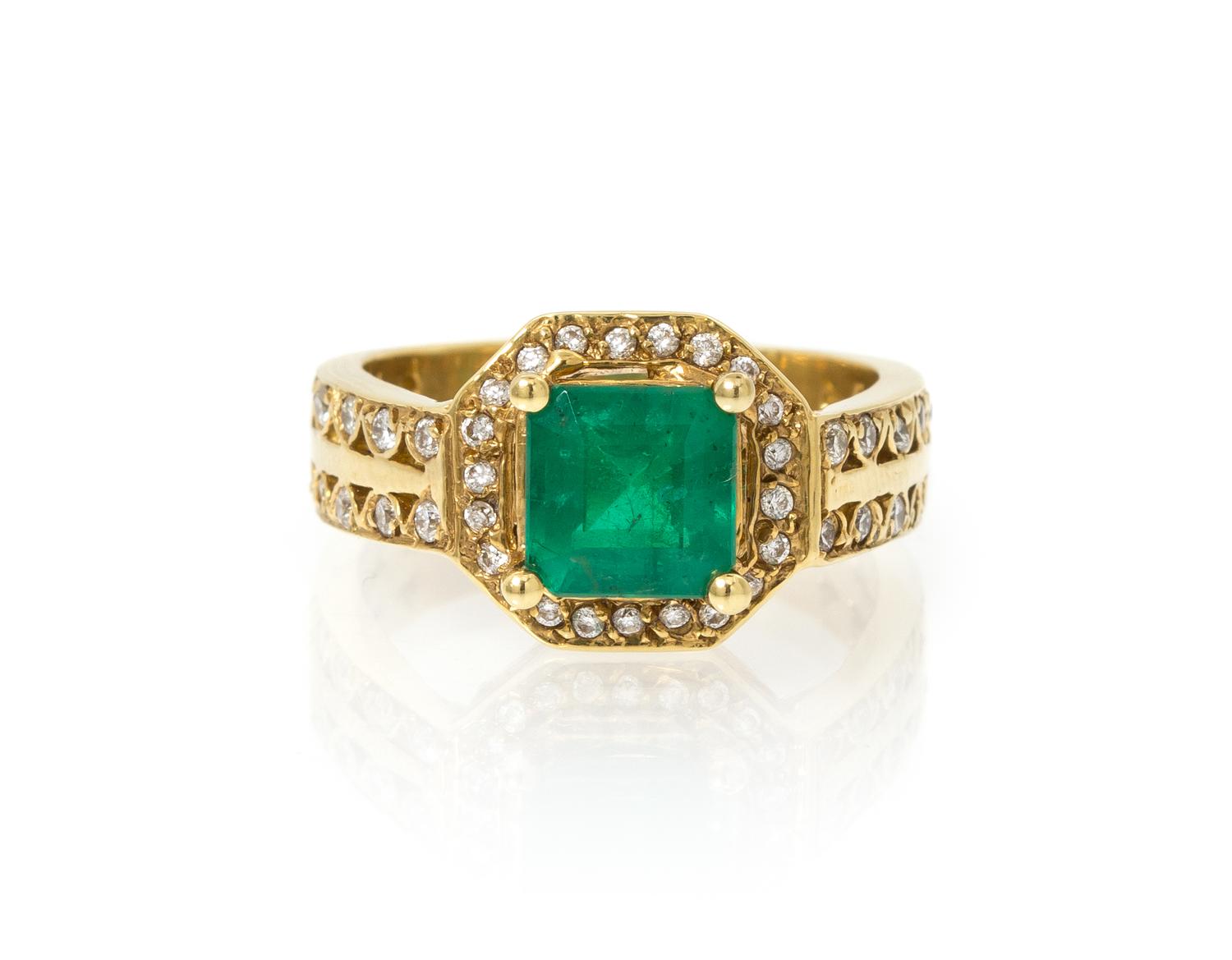 An 18 Karat Yellow Gold, Emerald and Diamond Ring, 7.30 dwts.