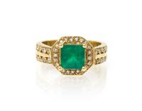 An 18 Karat Yellow Gold, Emerald and Diamond Ring, 7.30 dwts.