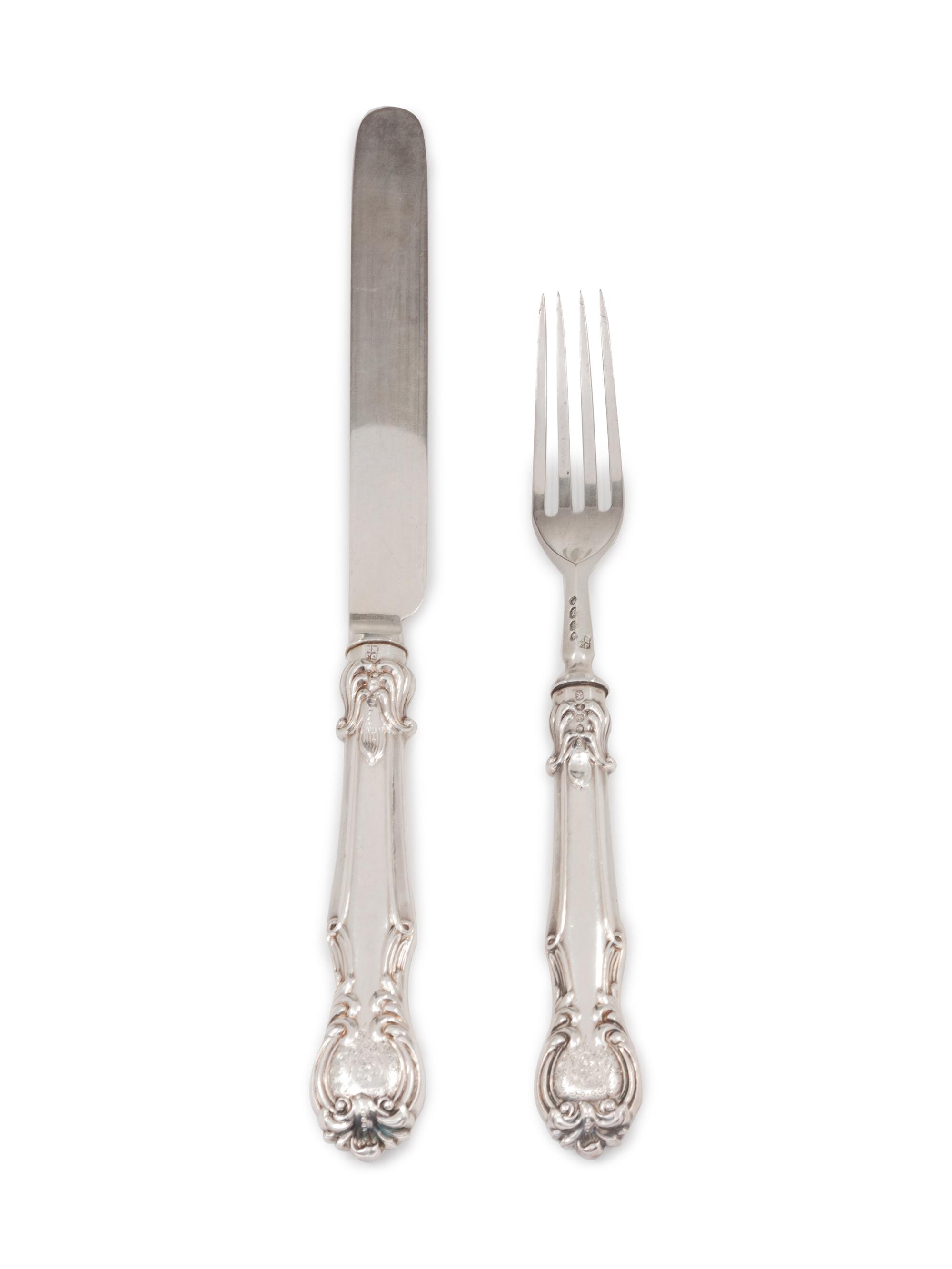 comprising: 12 forks 13 knives with stainless steel blades 25 items total.