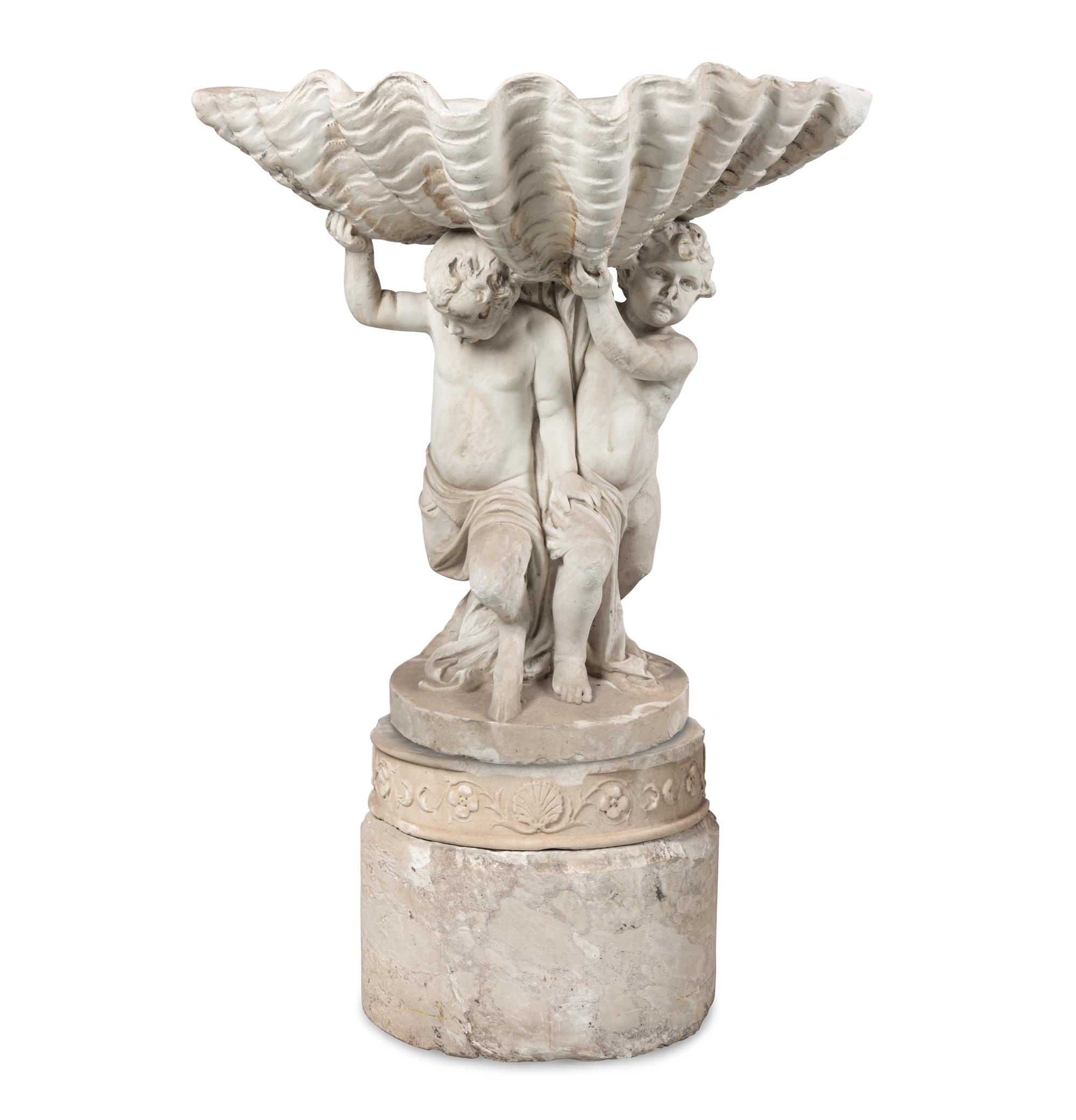 A Continental Carved Marble Fountain