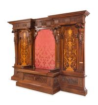 A Renaissance Revival Style Carved Walnut and Marquetry Hall Bench