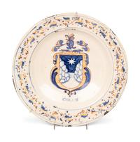 A Dutch Glazed Earthenware Armorial Charger