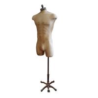 An Iron and Muslin Male Mannequin 26" W x 18" D x 67" H — United States, 20th Century