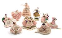 A Collection of Nine Dresden Porcelain Figures and Figural Groups Height of tallest 11 1/2 inches.