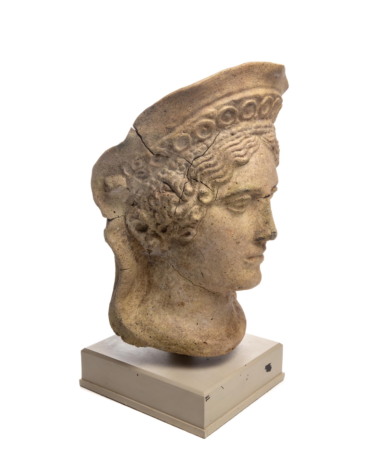 An Etruscan Terra Cotta Votive Head of a Veiled Woman