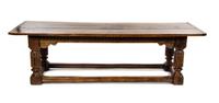A Jacobean Style Oak Refectory Table, Height 31 x width 100 1/2 x depth 33 inches.