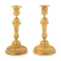 A Pair of Louis XVI Style Gilt Bronze Candlesticks