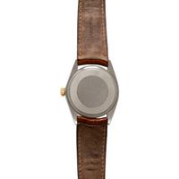 ROLEX, REF. 1512 STAINLESS STEEL AND 18K ENGINE TURNED YELLOW GOLD BEZEL 'DATE' 'ZEPHYR' WATCH, CIRCA 1970