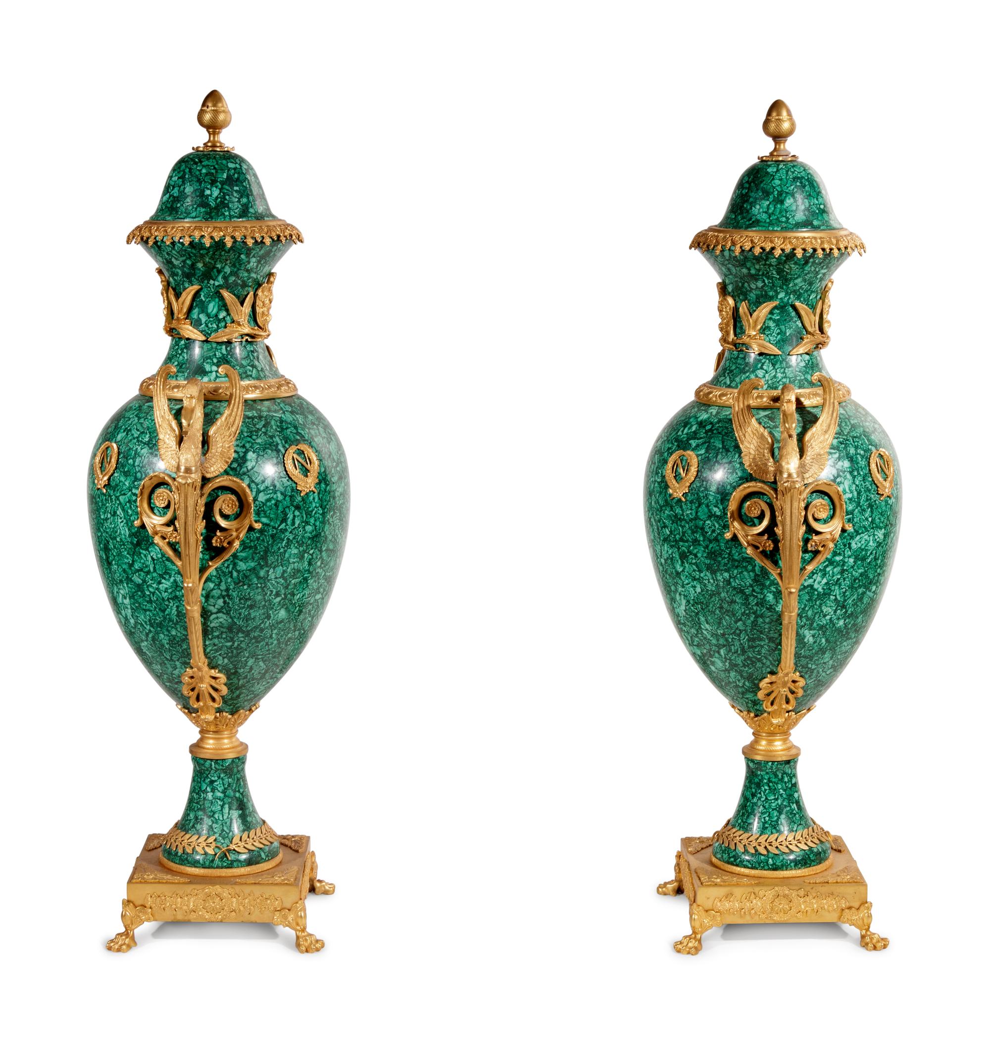 A Pair of Empire Style Gilt Bronze Mounted Malachite Veneered Urns