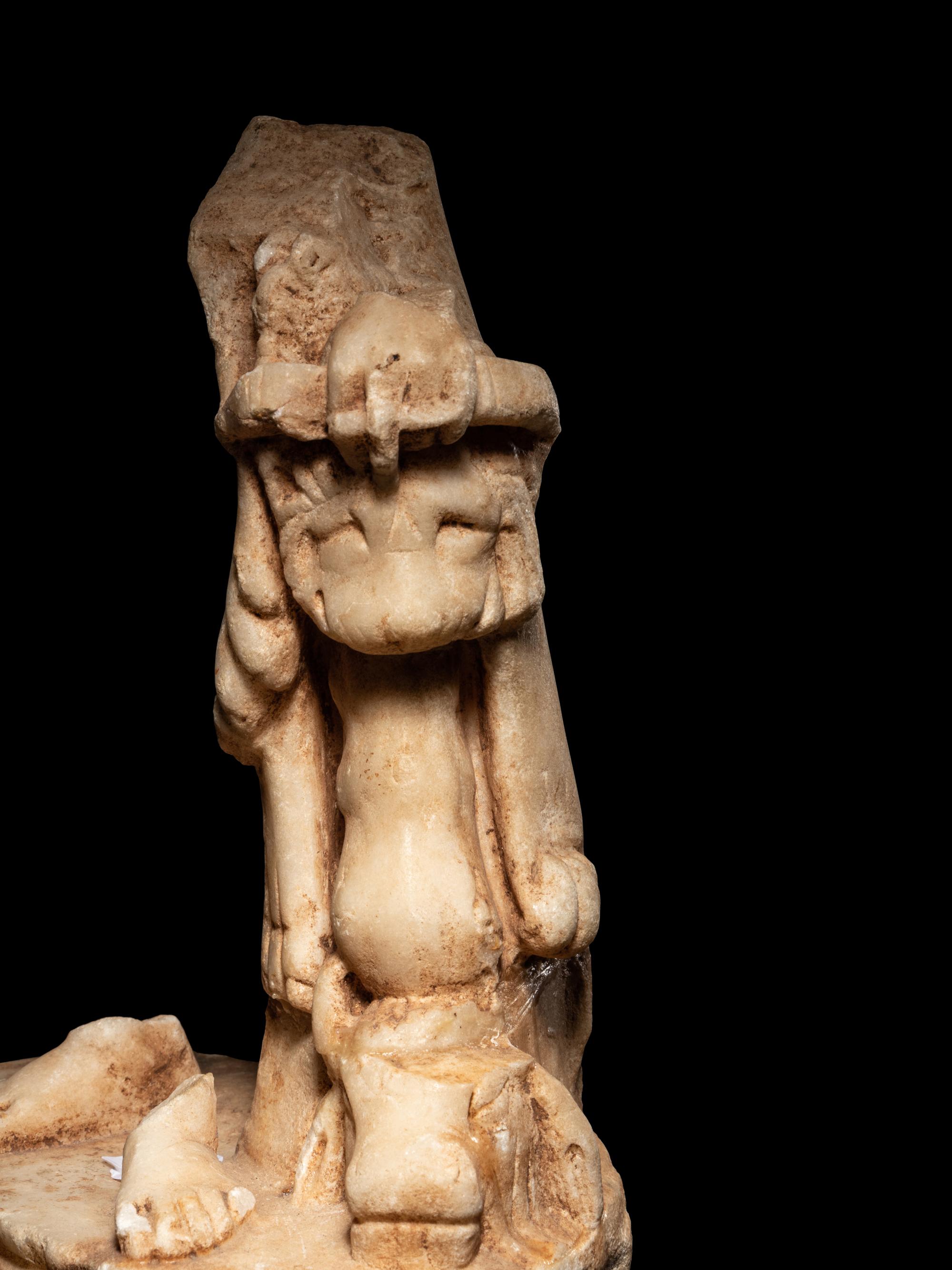 A Roman Marble Sculpture Base from a Statue of Hercules