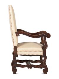 A Louis XIV Style Foliate and Scroll Carved Walnut Upholstered Fauteuil