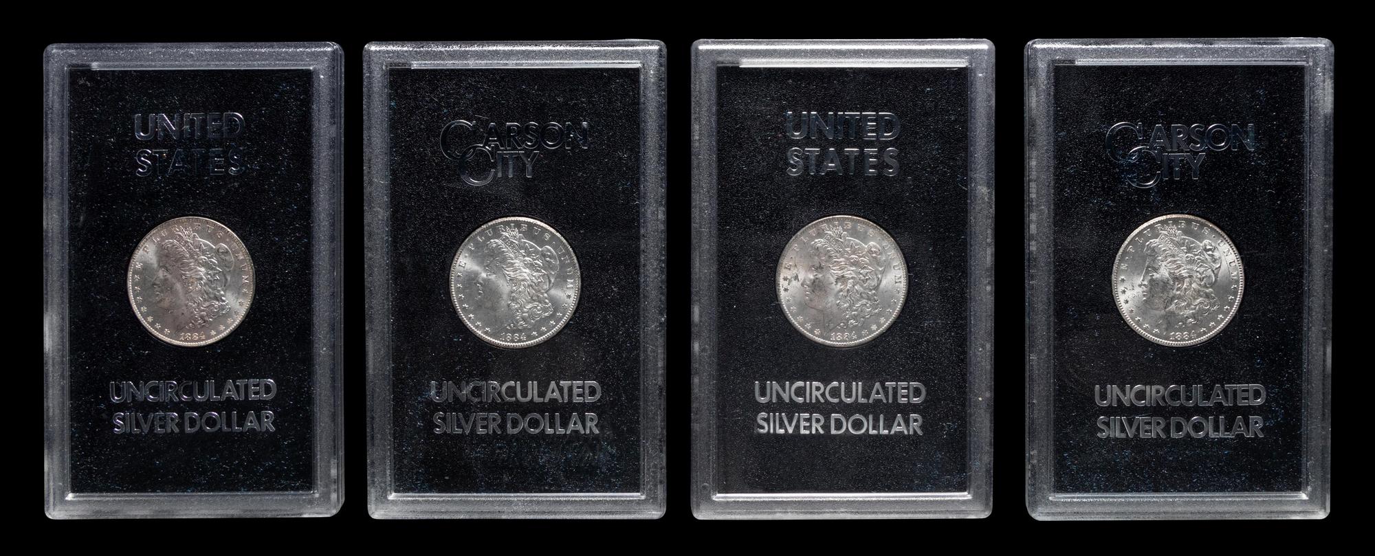 A Group of Ten 1884-CC GSA: Morgan $1 Coins